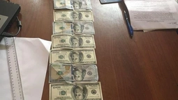 На Волині юристку затримали через 1000 доларів (фото)