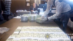 На хабарі в 1,5 мільйона доларів затримали топ-чиновників держпідприємства (фото)