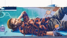 Луцький художник малював найбільше в Європі графіті на заправці (відео)