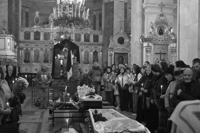 Луцьк навколішки попрощався з двома загиблими захисниками