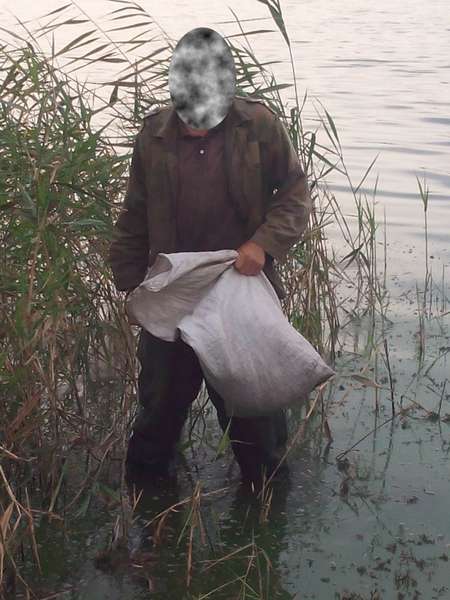 Чоловіка покарали за незаконний продаж риби на ринку у Світязі (фото)