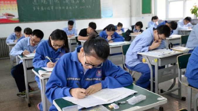 У Китаї зменшать обсяг домашніх завдань для школярів