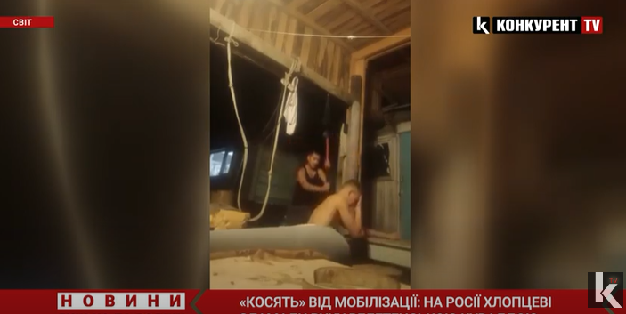 «Косять» від мобілізації: на росії хлопцеві зламали руку велетенською кувалдою (відео)